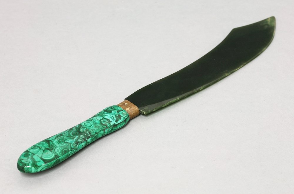 A hardstone letter knife, with sabre-shaped green: A hardstone letter knife, with sabre-shaped green hardstone blade and malachite handle, 34cm long