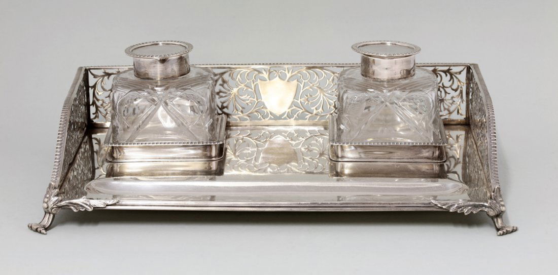A late Victorian large silver inkstand, by Charles: A late Victorian large silver inkstand, by Charles Stuart Harris, London 1898, of rectangular form, with pierced three-quarter gallery, fitted with two silver mounted cut glass ink bottles and with pe