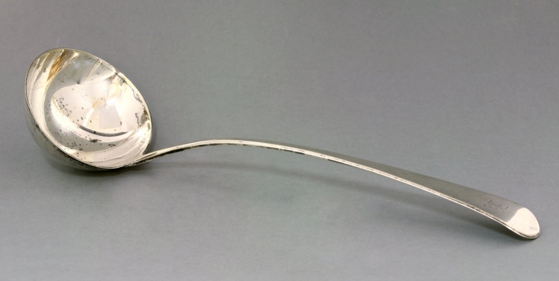 A George III silver old english pattern soup ladle, by: A George III silver old english pattern soup ladle, by Thomas Wallis & Jonathan Hayne, London 1810, monogrammed, 34cm long, 5oz