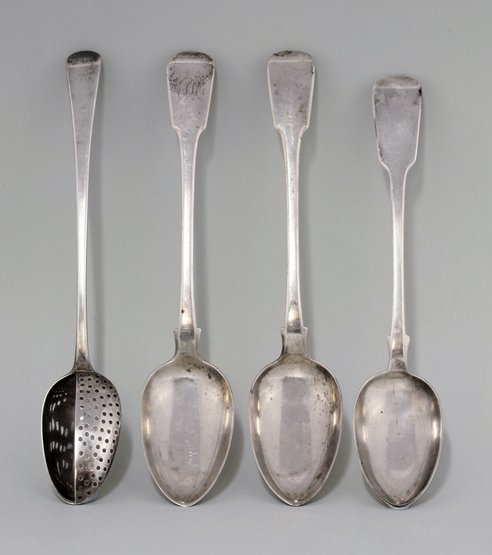 A George III silver old english pattern straining: A George III silver old english pattern straining spoon, by Richard Crossley, London 1790, a pair of silver fiddle pattern basting spoons, by Thomas Wilkes Barker, London 1820, one monogrammed, and an
