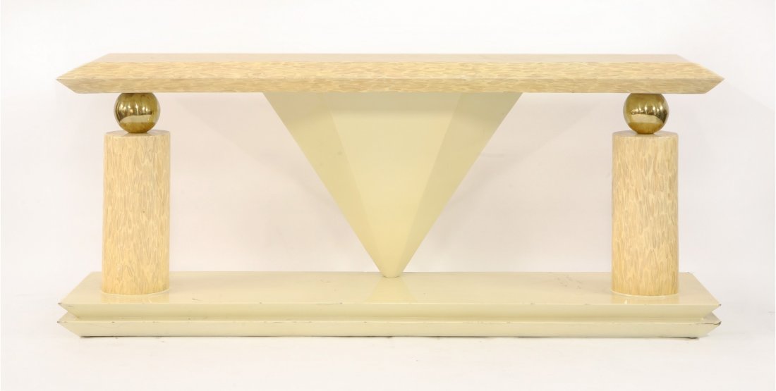 A composition and lacquered console table, the: A composition and lacquered console table, the chamfered top with yellow fossil-type inclusions, raised on ball and shaped supports, labelled 'Inexpor Ltda Hand Made in Colombia', 184cm wide 47cm deep