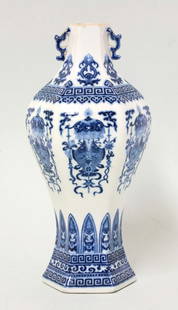 A blue and white Vase, mark and period of Qianlong,: A blue and white Vase, mark and period of Qianlong, the hexagonal pear-form body finely painted with groups of the Eight Babao under a canopy between stiff blade running key-fret borders, the reduced
