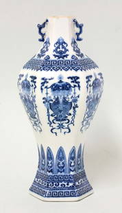 A blue and white Vase, mark and period of Qianlong,: A blue and white Vase, mark and period of Qianlong, the hexagonal pear-form body finely painted with groups of the Eight Babao under a canopy between stiff blade running key-fret borders, the reduced