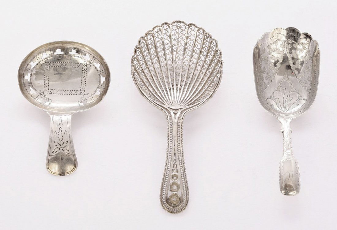 Two George III/IV silver caddy spoons, by Joseph: Two George III/IV silver caddy spoons, by Joseph Taylor, one Birmingham 1808, with bright cut decoration and pierced bowl, 6cm long, the other Birmingham 1820, with hollow fiddle pattern stem, the sca