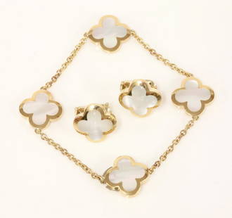 An 18ct gold 'Alhambra' bracelet and earring suite by: An 18ct gold 'Alhambra' bracelet and earring suite by Van Cleef & Arpels, the bracelet with gold framed, mother-of-pearl quatrefoils, between sections of trace chain to a concealed box clasp, signed a