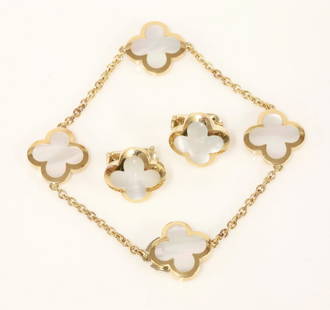 An 18ct gold 'Alhambra' bracelet and earring suite by: An 18ct gold 'Alhambra' bracelet and earring suite by Van Cleef & Arpels, the bracelet with gold framed, mother-of-pearl quatrefoils, between sections of trace chain to a concealed box clasp, signed a