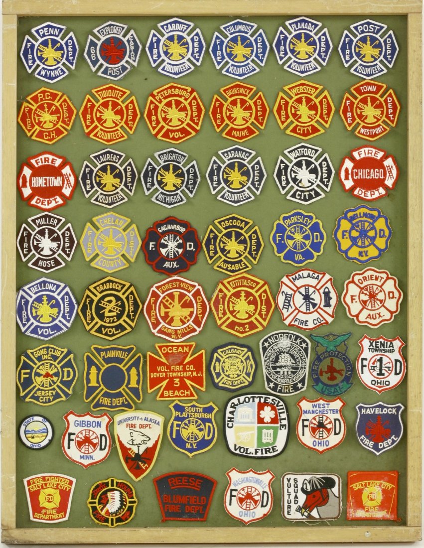 A selection of American cloth Fire Brigade badges,: A selection of American cloth Fire Brigade badges, consisting of: Volunteer Departments Columbus, Post, Cardiff, Explorer, Penn, Saranac, Watford together with Chicago, Havelock, West Manchester and m