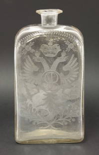 An interesting Spirit Bottle, late 17th century,: An interesting Spirit Bottle, late 17th century, probably Dutch or Bohemian, of rectangular section, the soda metal cut with the Imperial Russian double-headed eagle arms enclosing a monogram, the sid