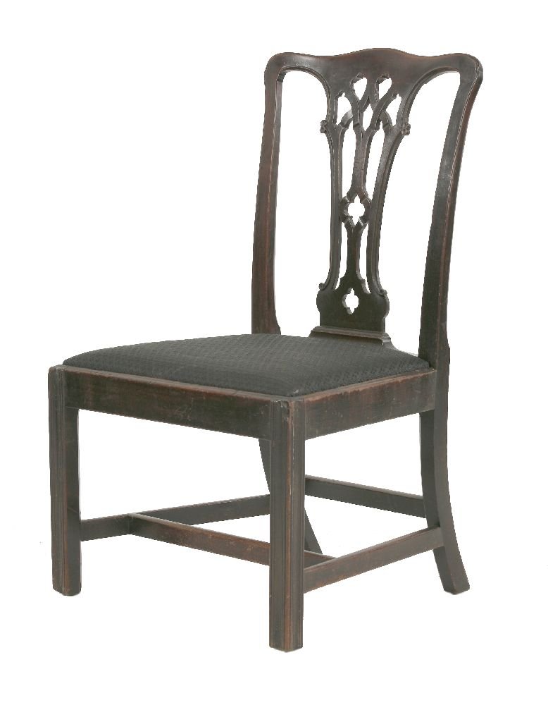 In the manner of Thomas Chippendale, a George III: In the manner of Thomas Chippendale, a George III mahogany single chair, with a pierced splat over a later drop-in seat and chamfered and moulded front legs Literature:Chippendale's 'Director', plate