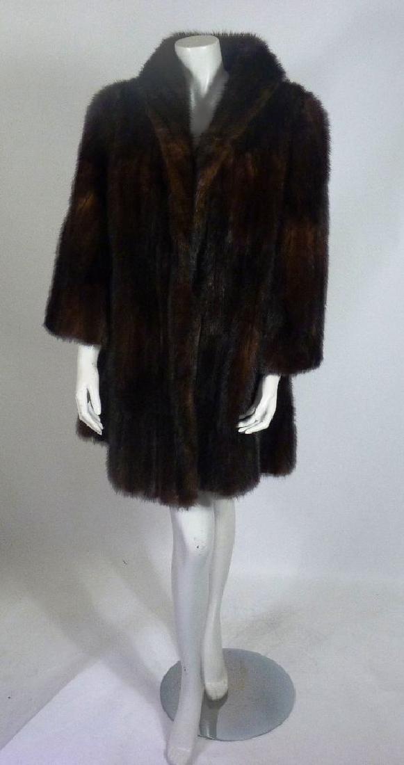 A dark brown mid-length mink fur coat (1 of 3)
