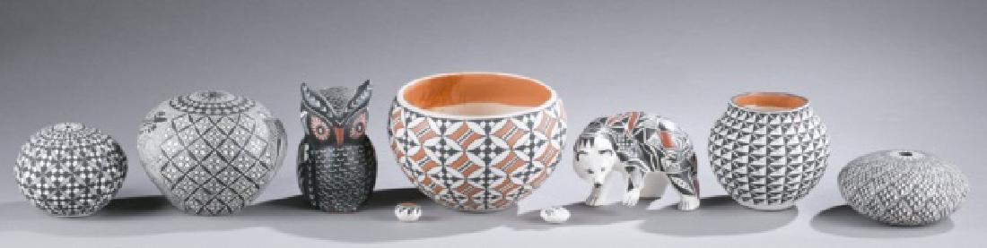 Group of 9 Acoma Pueblo pottery by R. Boren.: A group of 9 Acoma Pueblo pottery by R. Boren. 20th century. Each signed on bottom. ++ Seed pot with black and white geometric design. 3 1/4"h. ++ Seed pot with geometric motif and lizards in black an