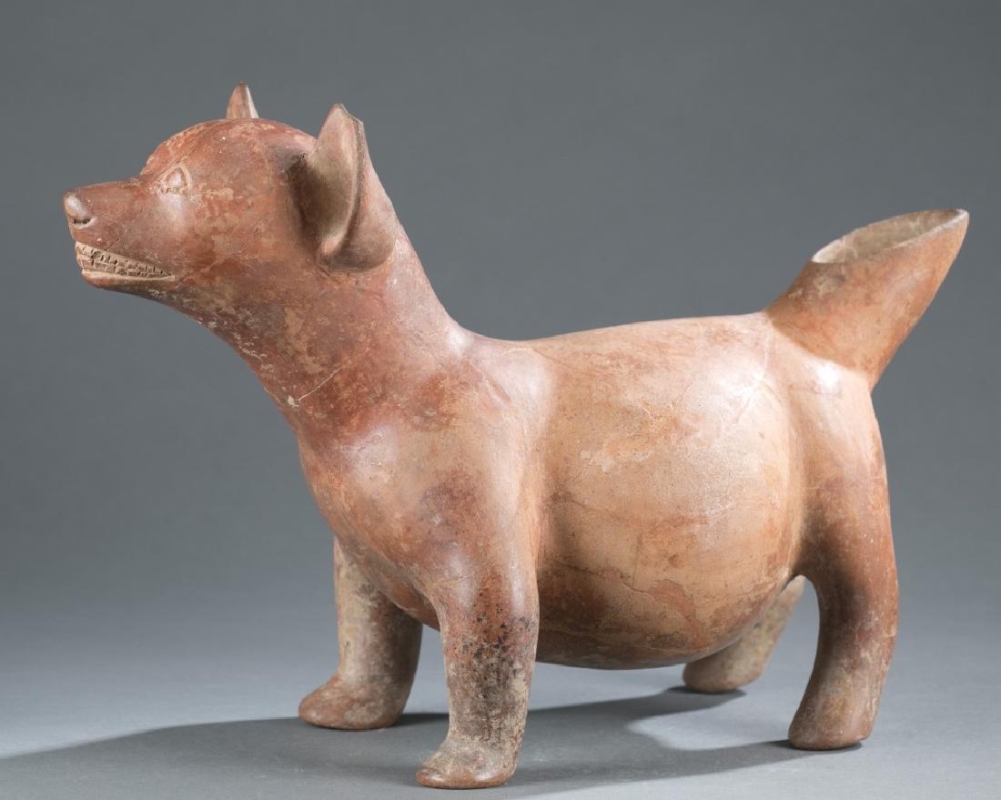 Standing dog with cylindrical shaped tail. (1 of 4)