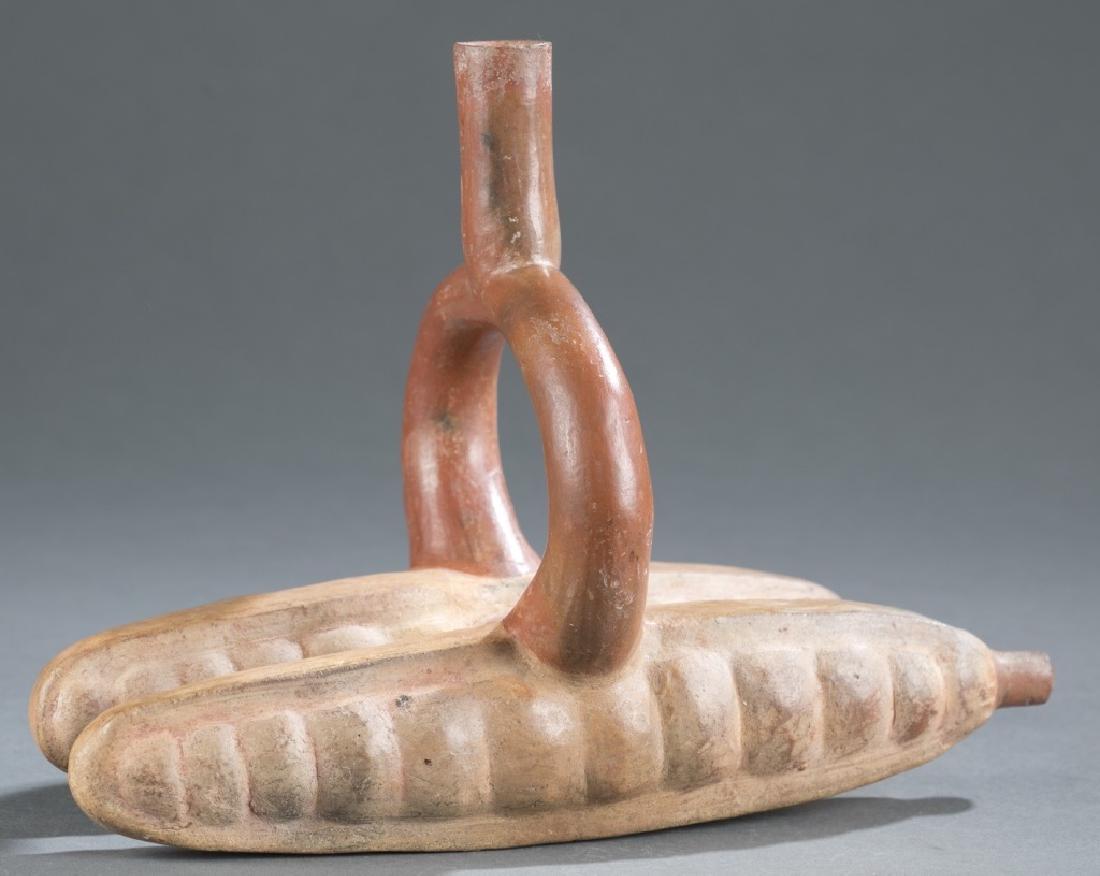 Stirrup vessel in the form of 2 cylindrical object (1 of 3)