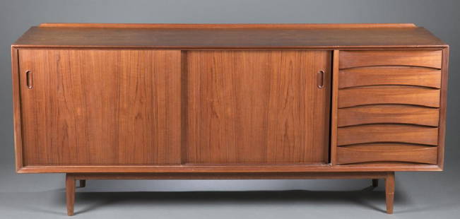 Povl Dinesen mid-century modern sideboard credenza: A Povl Dinesen mid-century modern teak sideboard / credenza with interior drawers and cut out pulls. 38 1/2"h x 71 7/8"w x 19 1/2"d.