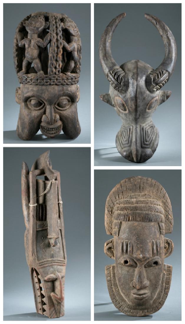 4 West African style masks. 20th century. (1 of 13)