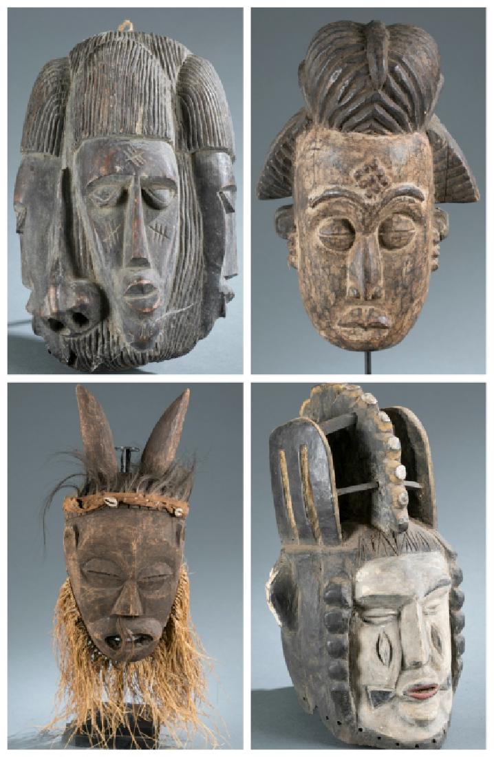 4 African masks. (1 of 15)