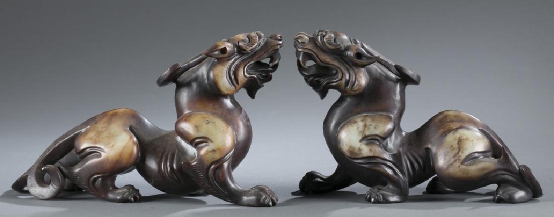 Pair of archaic-style stone mythical creatures. (1 of 9)