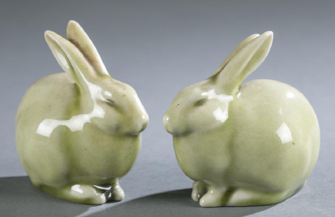 Pair of Rockwood pottery grove bunny paperweights.: A pair Rockwood Pottery of Grove Bunny paperweights, c. 1945. Marked on bottom. 3 1/4" x 3".