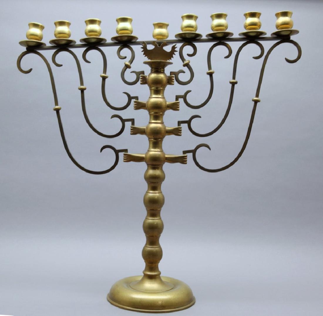 Menorah, copper alloy, c. 20th century.: Menorah, copper alloy, c. 20th century. A reproduction of a 19th century Austro-Hungarian or German menorah. Made by Harold Rogovin (New York, 1926-2007) of Brass Artisans. 23 1/8" x 23 1/4".