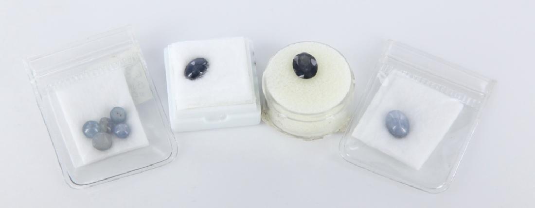 Group of loose star sapphire & blue spinel stones.: Group of 8 loose star sapphire & blue spinel stones. ++ 5 unheated star sapphire stones, 6.92 total ctw. Burma. ++ Oval star sapphire stone, 4.19ctw. ++ Oval star sapphire stone. ++ Oval blue spinel s