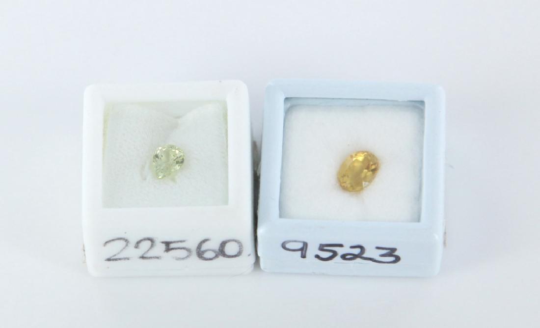 2 yellow loose stones. Chrysoberyl & beryl.: A group of 2 yellow loose stones. ++ Tear drop 1.01 ctw. of natural green/yellow unheated chrysoberyl. ++ Oval 1.59 ctw of oval yellow beryl, Tanzania.