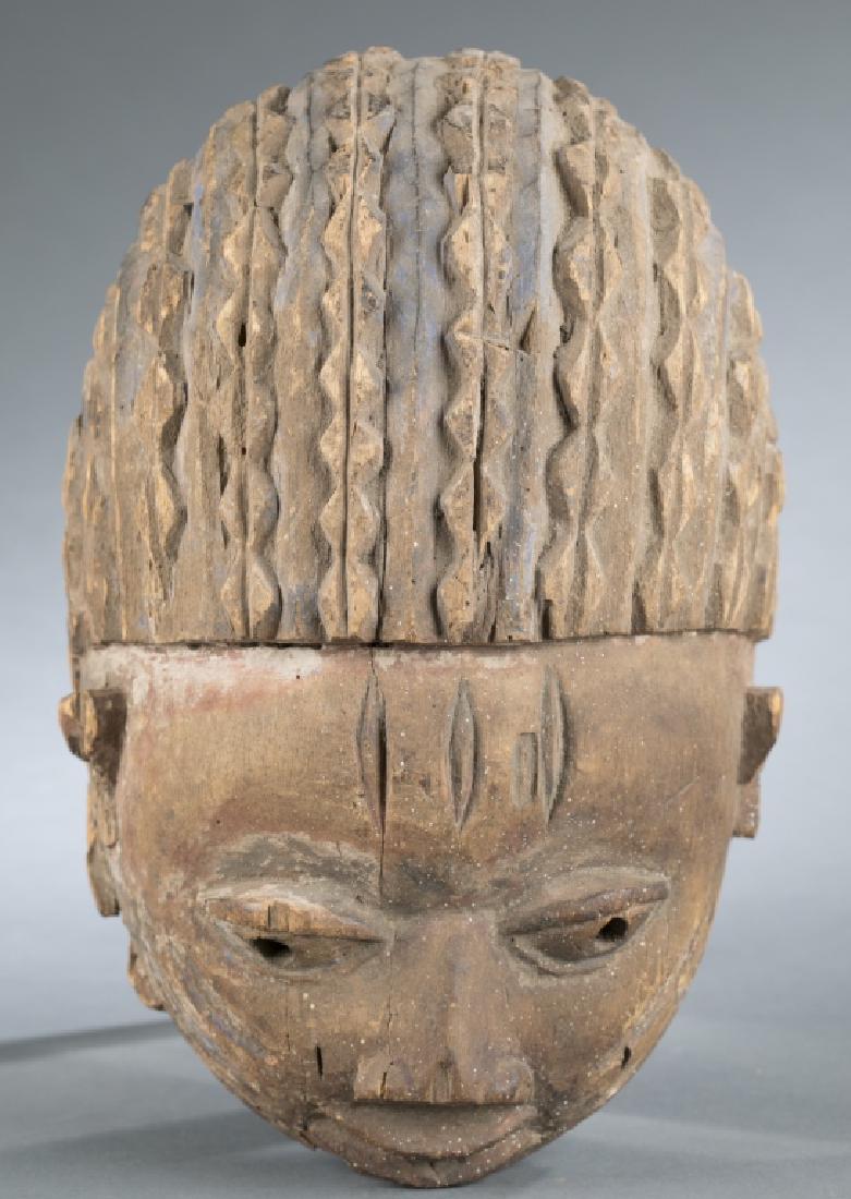 Gelede society headdres, Yoruba style. c.20th cen.: A Gelede society headdress Nigeria, Yoruba. c.20th century Inventory and Collection from the Estate of Merton D. Simpson.