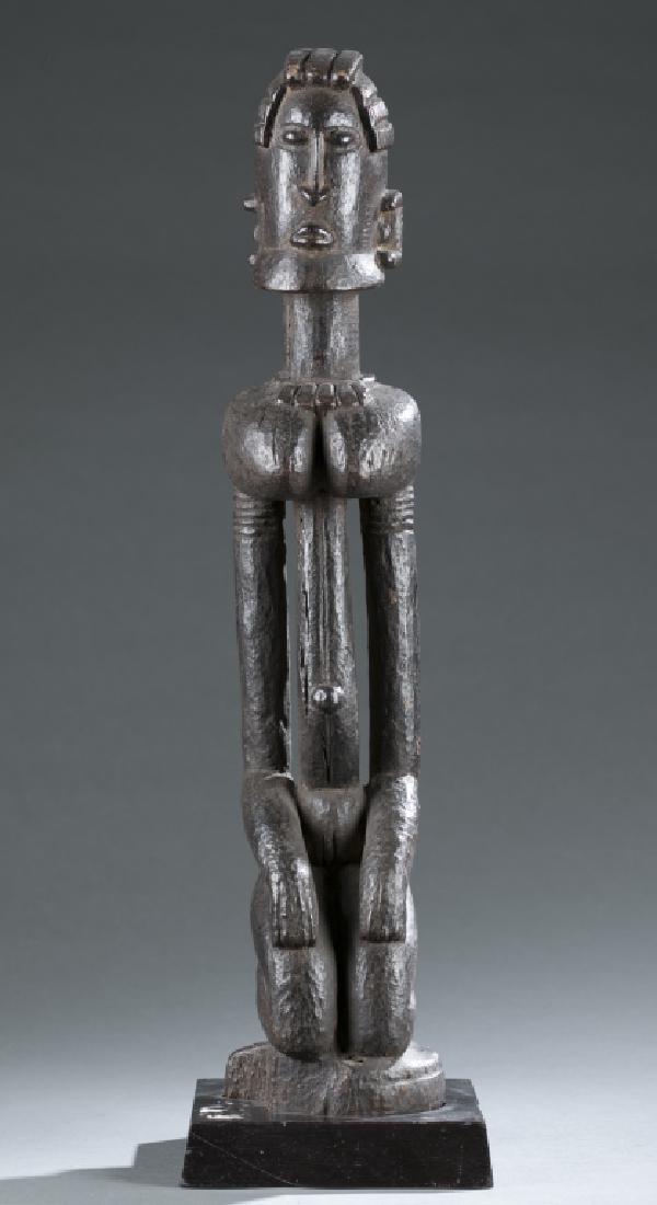 Dogon kneeling female figure. c.20th century. (1 of 4)