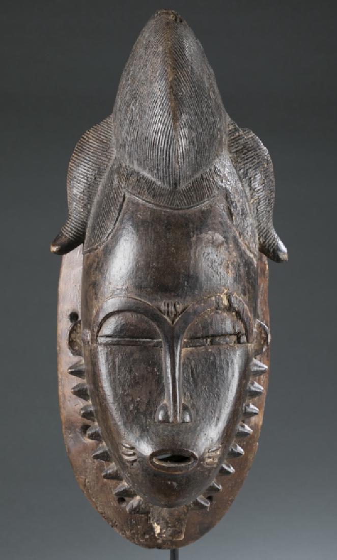 Baule style mask. c.20th century. (1 of 3)