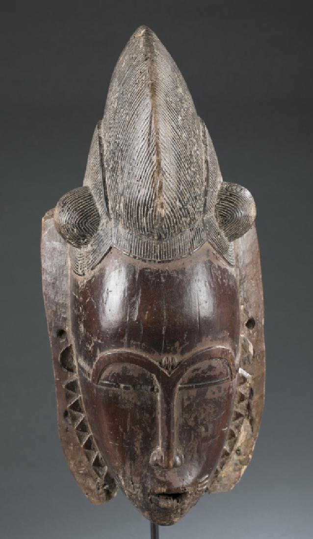 Baule style mask. c.20th century. (1 of 3)