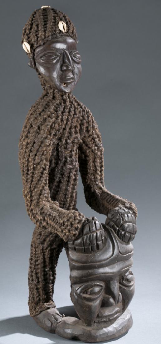 Seated Cameroon style figure (1 of 4)
