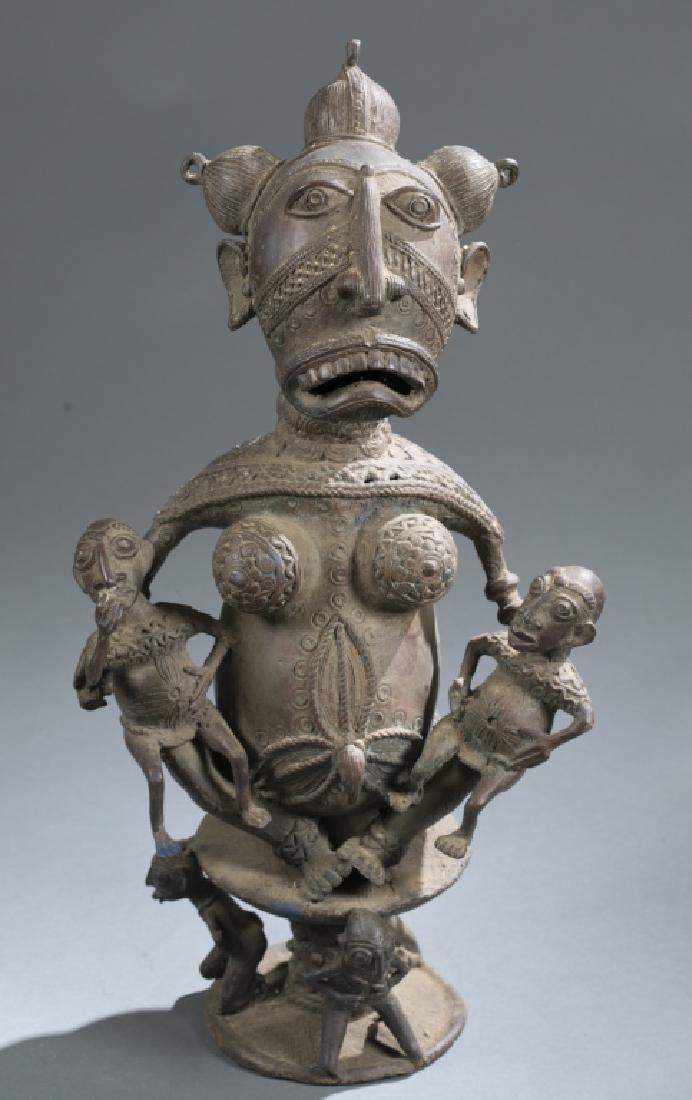 Cameroon style brass seated figure (1 of 2)