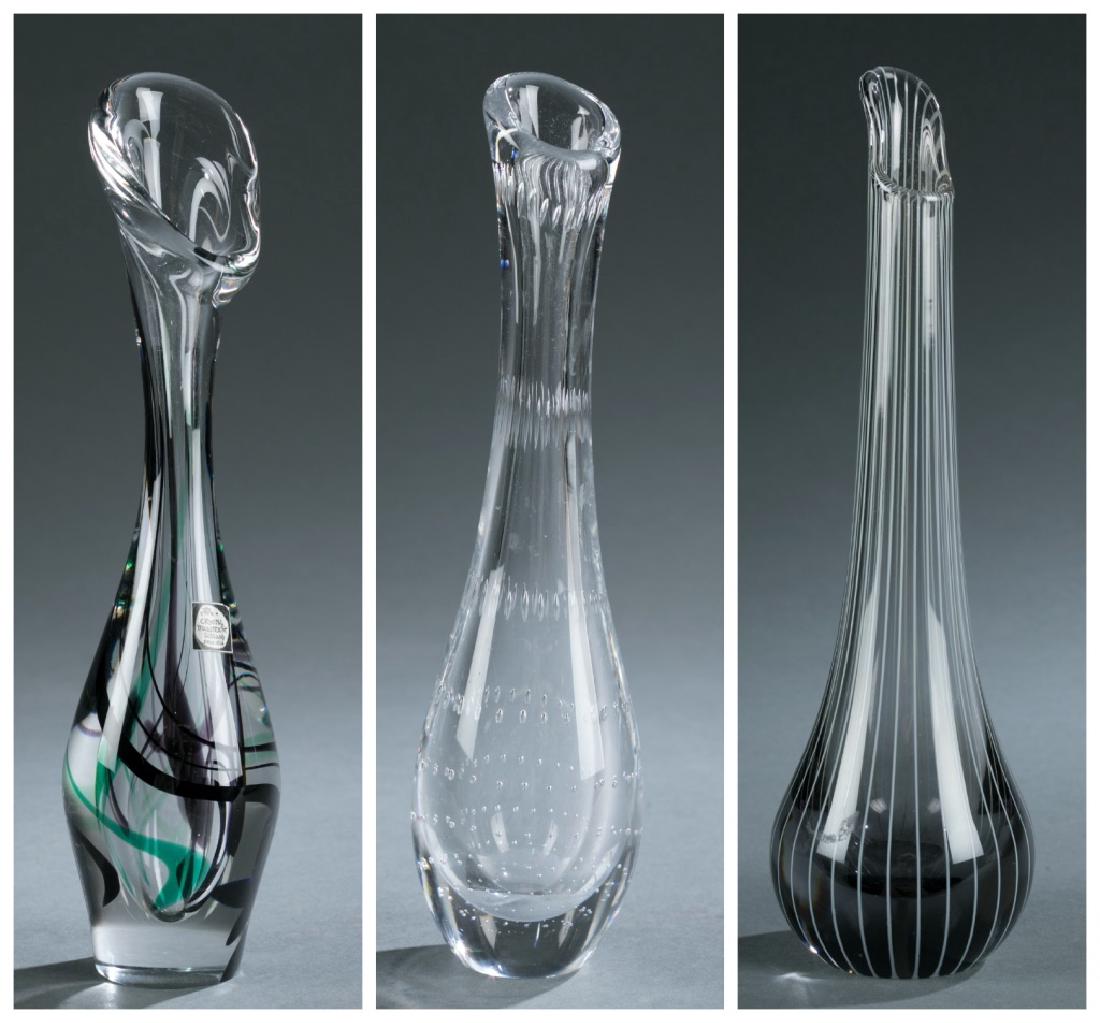 3 Art Glass Vases.: A Kosta Bosa art glass bowl by Vicke Lindstrand. Mid 20th century. Clear glass with black base. On bottom, inscribed Kosta, LS, and 618 (or 615). ++ A Crystal Masstricht crystal glass vase by Max Verb