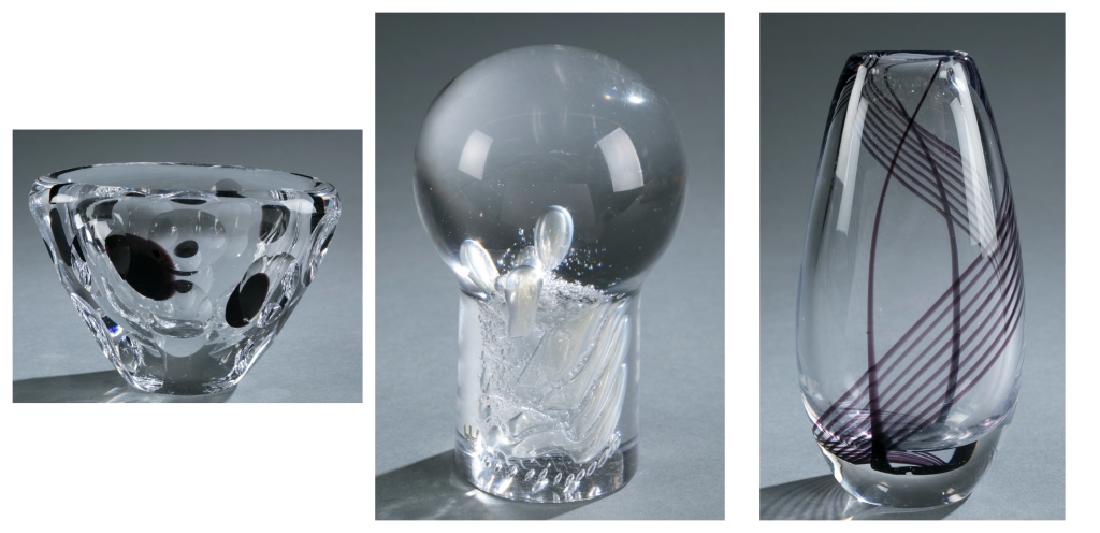 Kosta Boda paperweight, bowl & vase.: A Kosta Boda art glass paperweight by Goran Warff. Mid 20th century. Clear blown glass in a knob shape with design of controlled are bubbles and swirls. On bottom, inscribed Kosta, 69, and Warff. ++ A