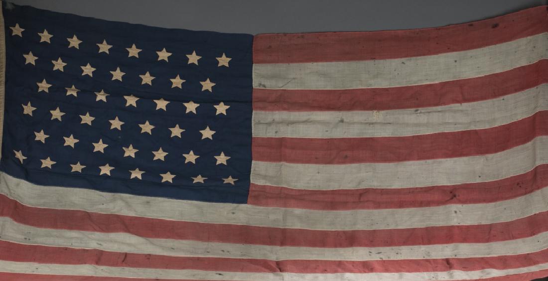 44 Star American flag: 44 Star American flag c. 1890. Issued when the state of Wyoming became part of the Union. Approx. 89" x 60" Provenance: **Client is looking for journals from the original owner, who may have been in t