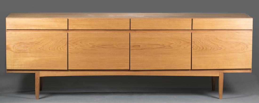Mobelfabrik teak sideboard cabinet. FA 66.: A Ib Kofod-Larsen (1921-2003) for Mobelfabrik, FA 66 cabinet, Denmark, teak, Faarup Mobelfabrik label. 30" x 90 1/2" x 19 1/2". Condition: Some scratches and scuffing.