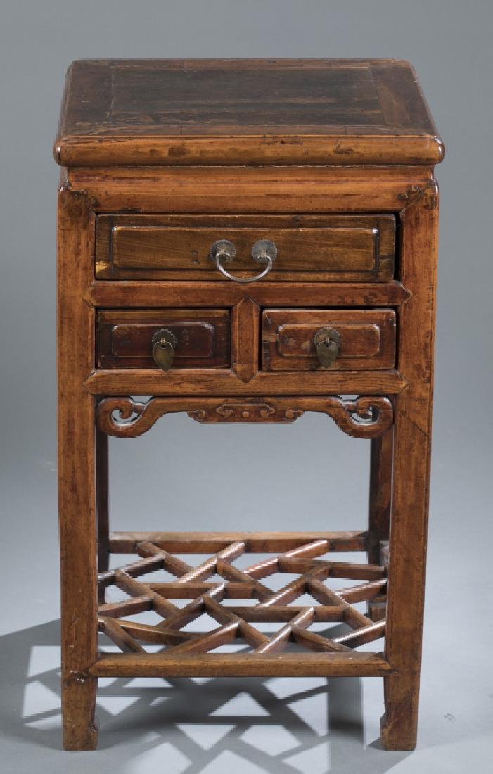 Chinese side table with drawers.: A Chinese side table/stand with drawers. 19th/20th century. Chinese elm. Square shape on straight legs with horse-hoof feet. Having one larger drawer near the top, with two smaller drawers beneath. Yo