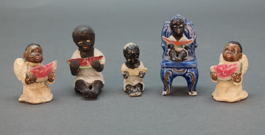 9 items: Black Am. ashtrays, watermelon figurines. (1 of 2)