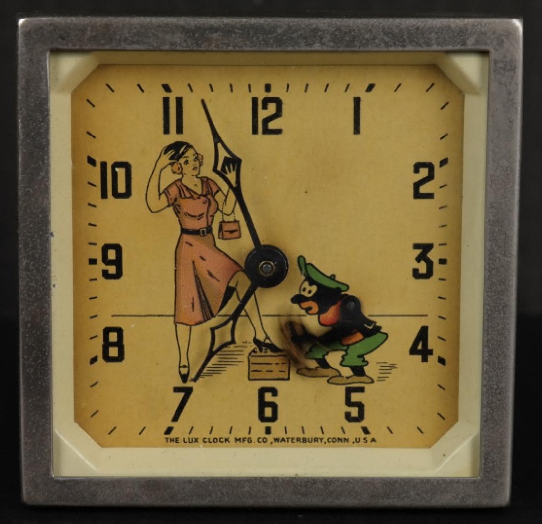 Clock with a moving shoeshine. (1 of 4)