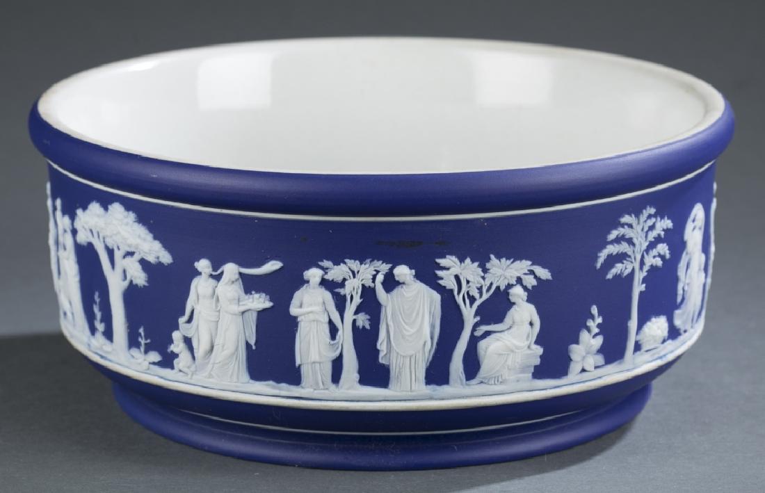 Large Wedgwood jasperware bowl. 1891-1897.: Large upright Wedgwood jasperware bowl in dark blue and white. c. 1895. 4" x 8 1/2". Provenance: The Wedgwood Collection of Adele & Alan Barnett.