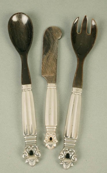 3-piece sterling & horn set, Jensen, Acorn.: Three-piece sterling silver and horn set by Johan Rohde for Georg Jensen, Copenhagen, in the ''Acorn'' pattern. Designed 1915. Fork (6 7/8''l), spoon (6 7/8''l), and butter spreader (5 3/4''l).