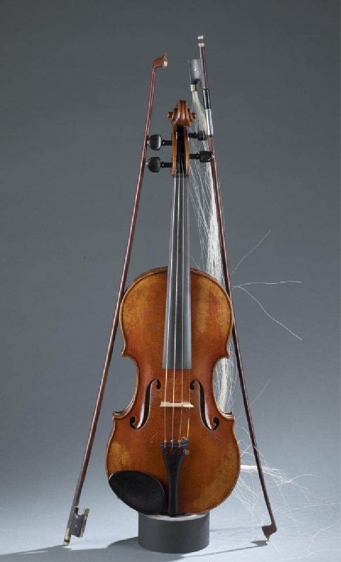 Hans Schirmer, violin, 20th cenutry.: Violin attributed to Hans Schirmer. 20th century. Included are two bows and a hard case. Marked "Hans Schirmer". 24" x 14".