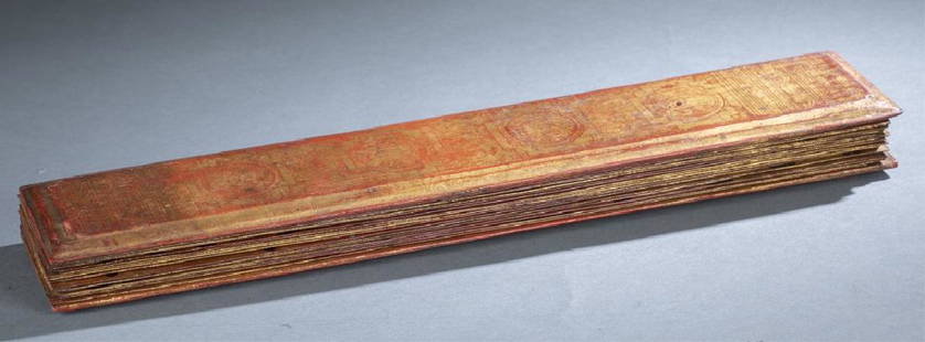 Burmese Pali Manuscript: A set of Pali Manuscript. Burmese Buddhist palm leaf Kammavacca. 20th century. Lacquered palm leaves with tamarind script written in black resin over red and gold ground with gold design on both sides