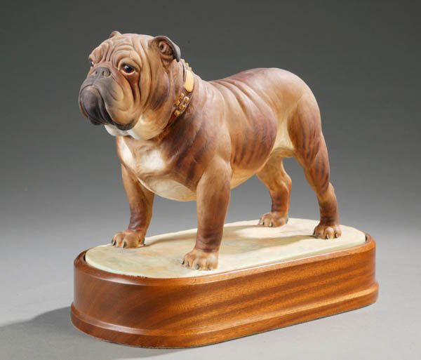 Royal Worcester. Bulldog figure.: Royal Worcester Bulldog. c.1968. Modelled by Doris Lindner. Together with a hardwood stand. Limited edition 323/500. Marked on bottom. With stand: 8 1/4''h x 10 1/4''l.