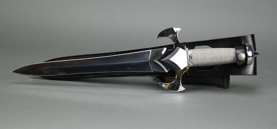 4 Gil Hibben Knives, including Gold Edition.: Gil Hibben Knives. 4 total. Includes: 50th Anniversary Immortal Gold Edition knife. 2007. 24" overall. 15-9/16" (3/16" thick) 420 J2 stainless double edged blade. Gold plated solid metal guard and pom