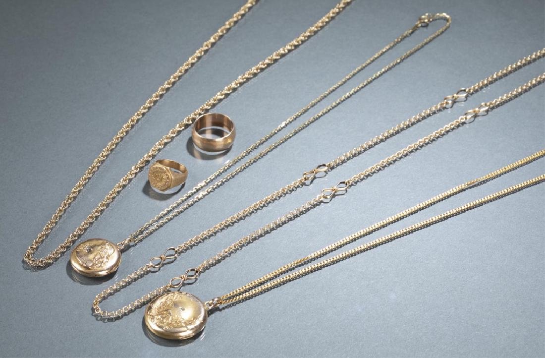 6 gold items including lockets, rings & chains. (1 of 6)