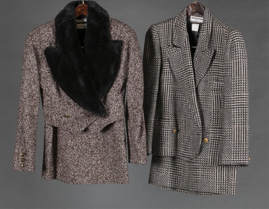 2 Sonia Rykiel, Skirt Suits.: A group of two Sonia Rykiel Skirt Suits. ++ Sonia Rykiel tweed suit jacket and skirt set in burgundy and cream with black faux fur collar. Label "Sonia Rykiel Paris. Garfinckel's" Approximate measurem
