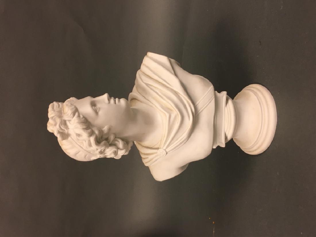 English Parian Bust of Apollo Belvedere: English Parian Bust of Apollo Belvedere, Circa 1861. Unmarked, probably Bates, Brown-Westhead, impressed 9 and 854. Model by C. Delpech. 12"
