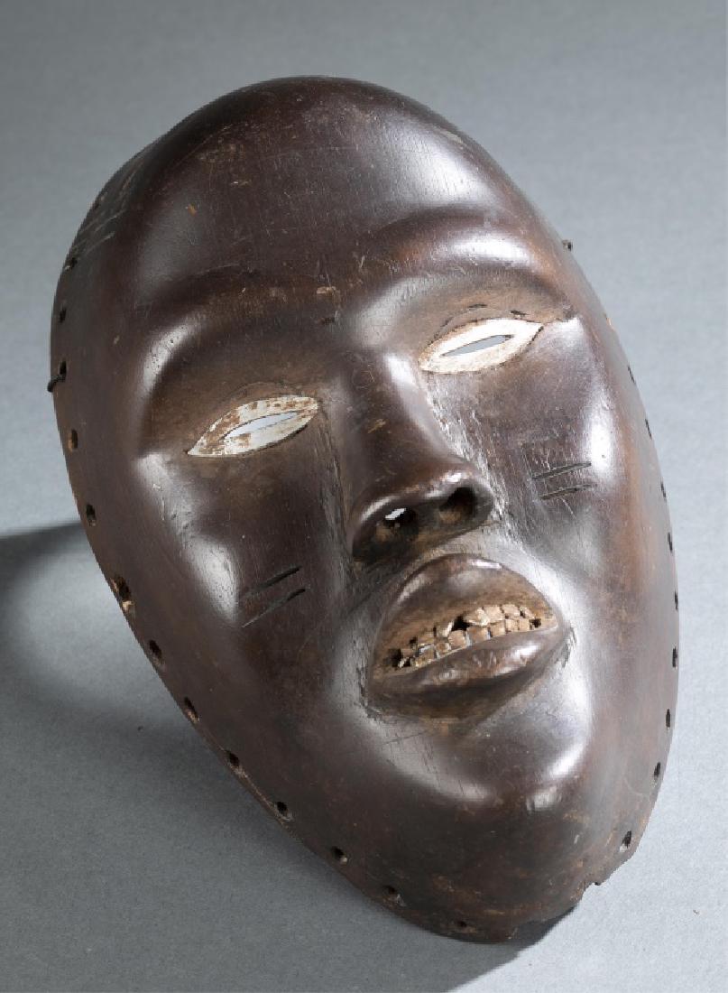 Dan or Mano face mask. 20th century. (1 of 3)