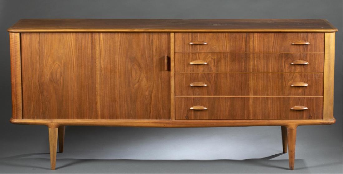 Moreddi Danish modern credenza.: Moreddi Danish modern teak credenza with four drawers and two shelves. Branded label in drawer. 31" x 70 1/2" x 18 1/2".