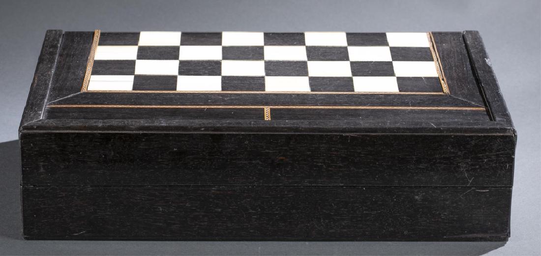 Ebony & Ivory Indian Chess/Backgammon Board.: An Ebony and Ivory Indian Chess and Backgammon Board. circa 1800. Includes documented authentication. Wood inlay decoration. Some ivory squares are cracked. 4 3/8" x 10 3/8" x 17 7/8." THIS LOT CONTAI